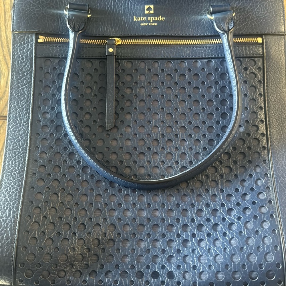 Like new Kate Spade purse. 13” H x 13”W x 7” inside zipper compartment